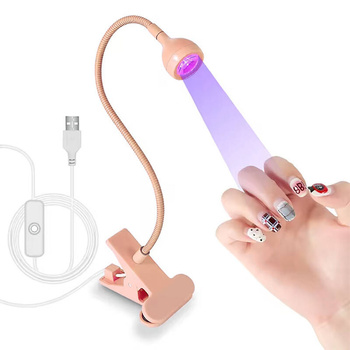 Flexible mini LED lamp - a clip-on flashlight for manicure peach color